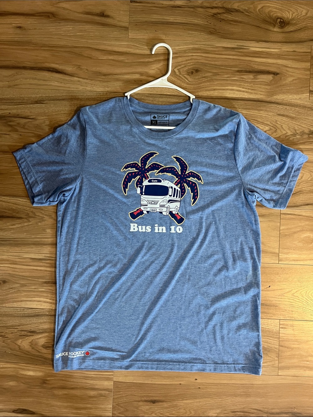 Sauce Hockey Men’s Blue Graphic Tee - "Bus in 10"